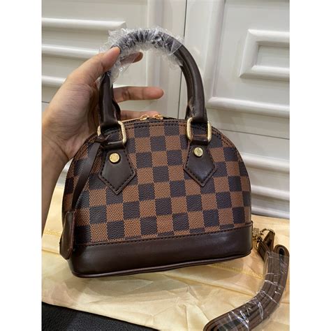 Harga Online Tas Louis Vuitton Alma Original .